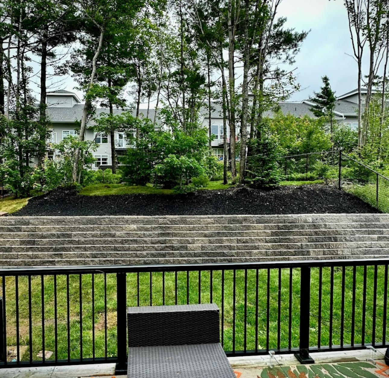 Finished retaining wall installation by Universal Landscaping