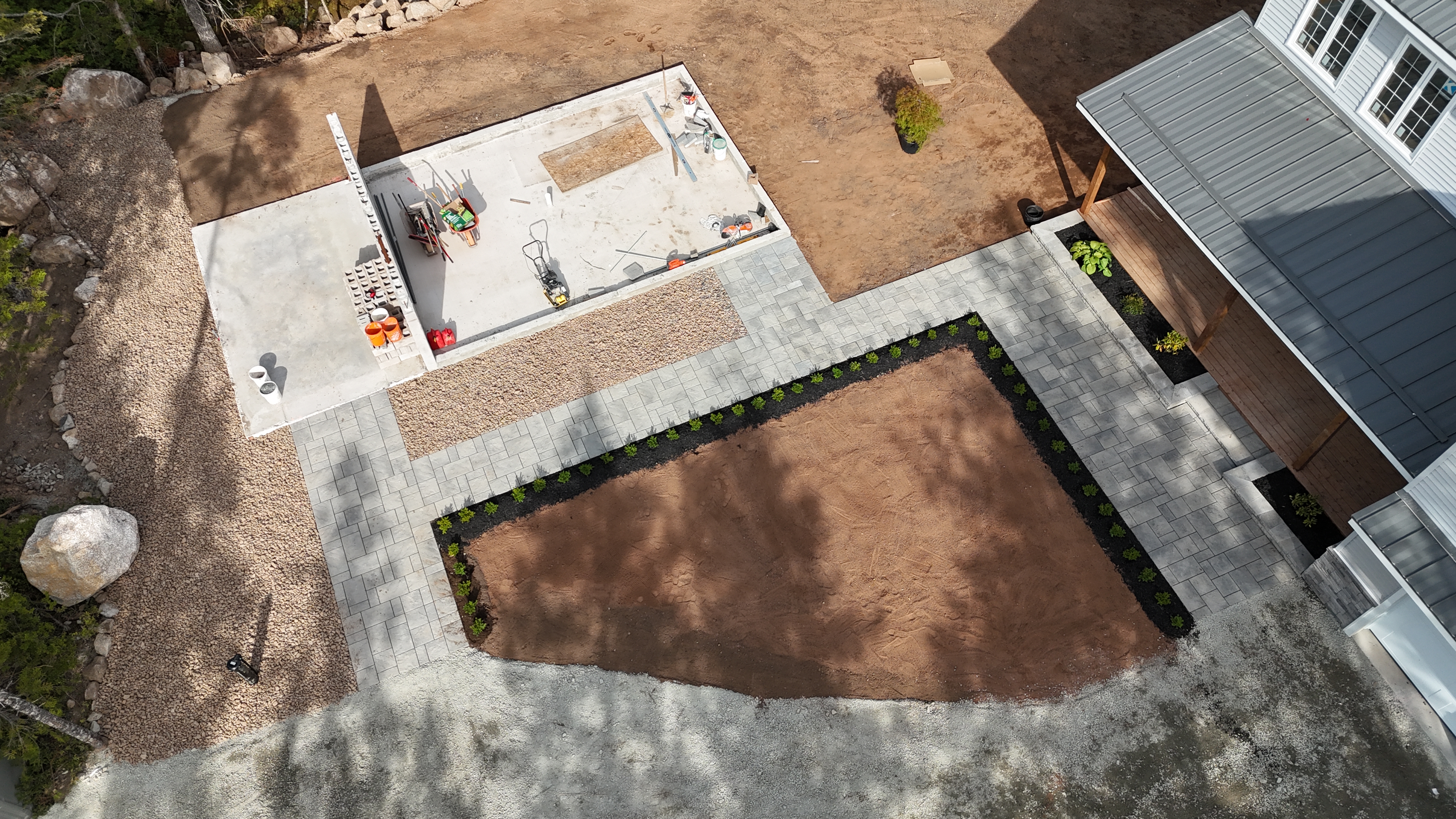 Finished paver patio installation by Universal Landscaping